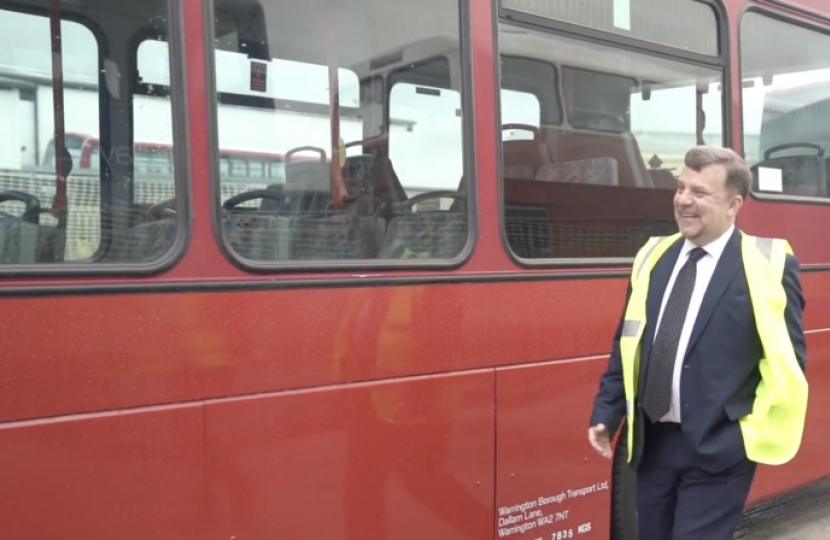 Andy Carter MP next to Warrington bus