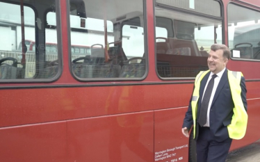 Andy Carter MP next to Warrington bus